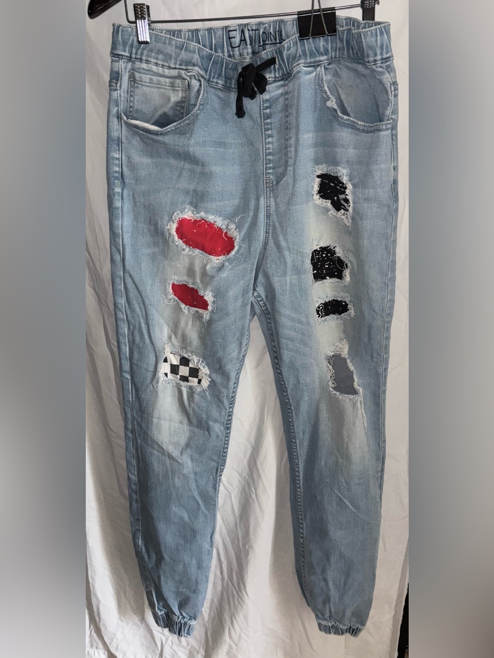 Men’s East Pointe Light Wash Distressed Patchwork Denim Joggers